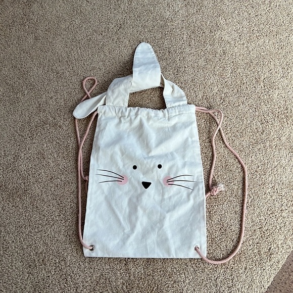No brand off white canvas back pack with tie. main image 6